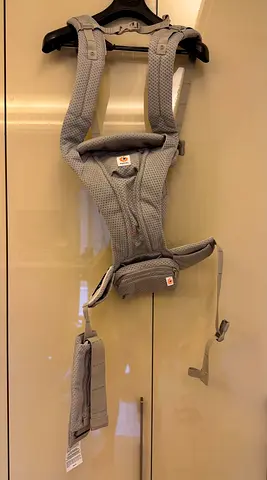 Never Used - Light grey ergobaby carrier (excellent condition)
