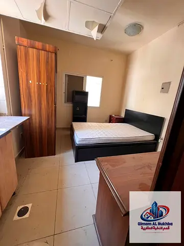 Cheapest large studio in Al Majarah, Sharjah! Central AC/gas, free parking, easy payments. Prime location near Corniche & Al Yom Al Jadeed.