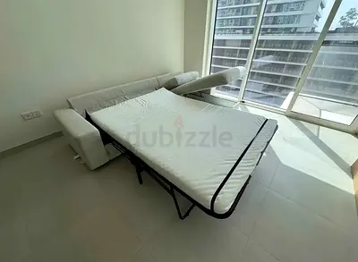 Light grey 3-seater sofa bed with mattress - good condition