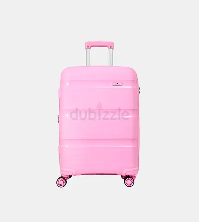 Pink hard-shell carry-on suitcase with 4 wheels and telescopic handle / price 70 AED