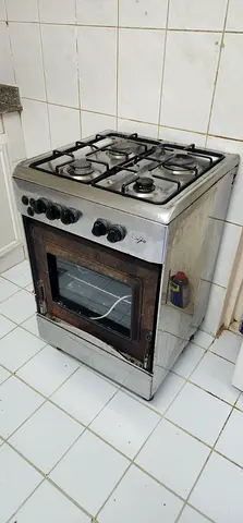 Used freestanding gas stove with oven - stainless steel