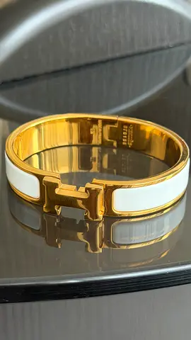 Gold-tone Hinged Bangle Bracelet with White Enamel Inlay (H-style clasp)