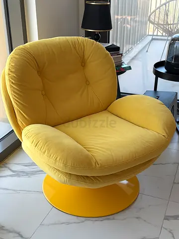 Yellow swivel lounge chair - comfortable single armchair