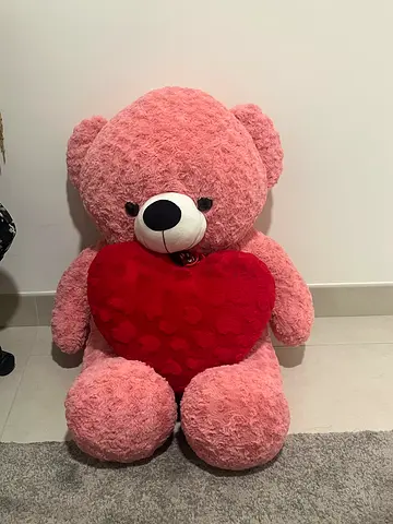 Large pink plush teddy bear with red heart - good condition