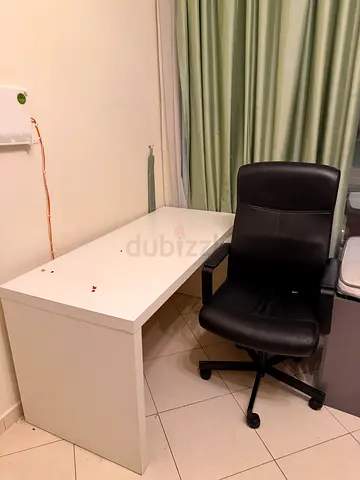 White big office desk and adjustable one side small table and black swivel chair - used