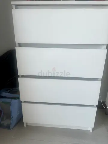 White wooden wall-mounted shelf / slatted storage rack