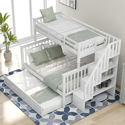 White wooden triple bunk bed with storage stairs and trundle