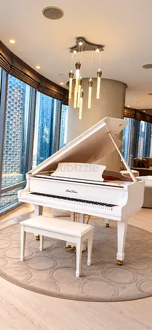 White Pearl River Grand Piano