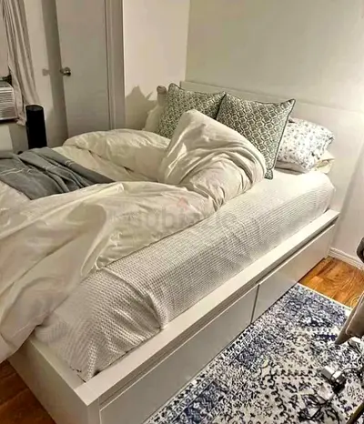 IKEA queen size bed with mattress and storage drawers