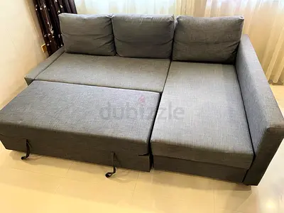 Grey L-shaped Sofa Bed with Storage — Good Condition