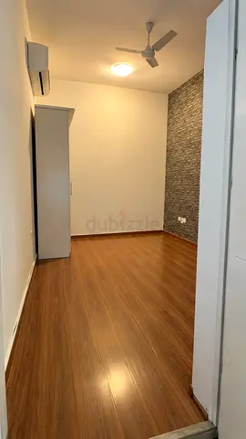 A medium size room In a Family Villa Al Warqa 4