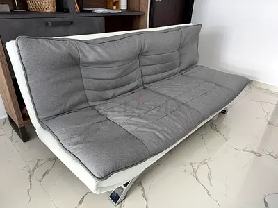 Modern white frame futon sofa bed with grey cushion - good condition