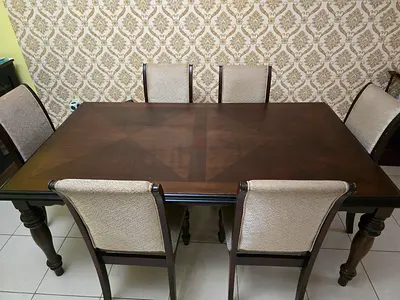 Solid wood dining table with 6 upholstered chairs