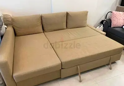 Beige L-Shaped Sofa Bed with Pull-Out Extension