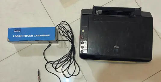 Used Epson All-in-One Printer (with power cable and spare toner box)