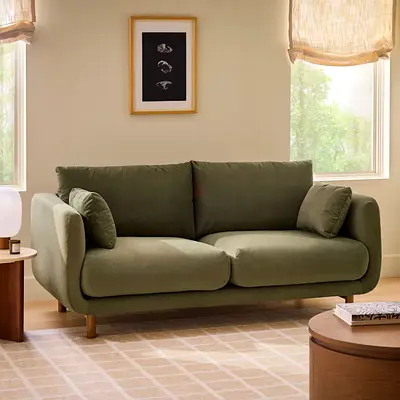 Olive green curved silhouette 2 seater sofa