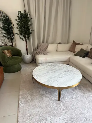 Bloomr. Moura round marble-top coffee table with brass frame