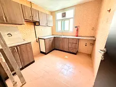 LAVISH BIG SIZE 1BHK WITH BALCONY ON ROAD BUILDING IN MUWAILEH