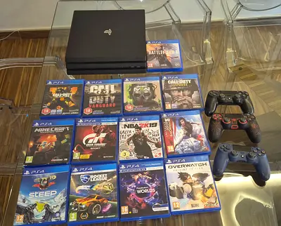 PS4 PRO latest Gen, + 13 games + 3 controllers