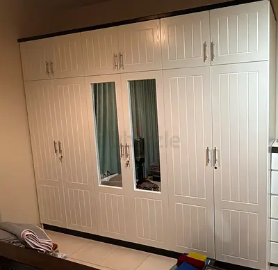 White freestanding 6-door wardrobe with mirrored panels