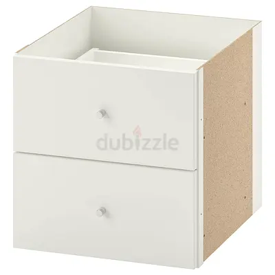 White storage cabinet with drawers and baskets - good condition