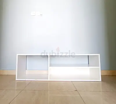 White low TV stand / media console with open shelves