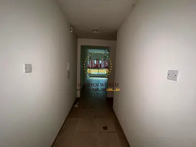 2BR apartment in Al Majaz 2 with free AC and parking. Prime location near services. Annual rent AED 55,000.