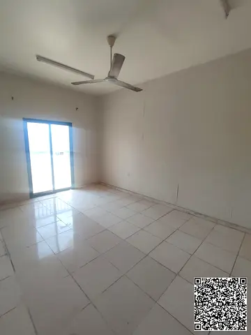 A unique one-bedroom apartment with a living room in Al Nakheel for annual rent