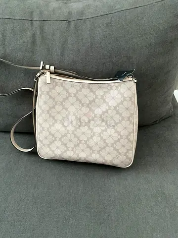 Kate Spade - Original , Brand New Light grey patterned crossbody handbag -
