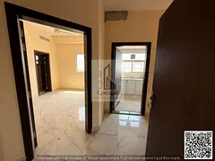 Two bedrooms and a living room in Al-Aliya