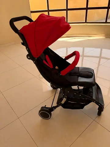Lightweight red baby stroller / standard pram in good condition
