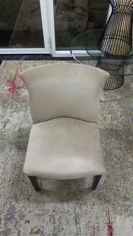 Beige Upholstered Dining Chair with Dark Wood Legs