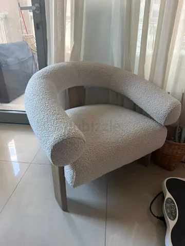 2 Curved boucle accent chair with wooden legs