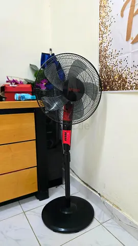 Super General 16” Stand Fan with Remote in red and black color.