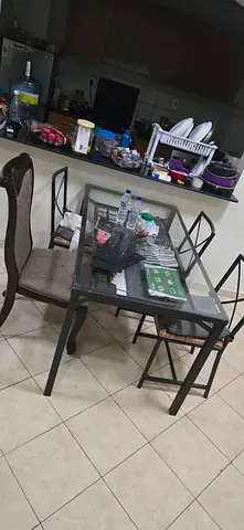 Glass top dining table with 3chairs - used