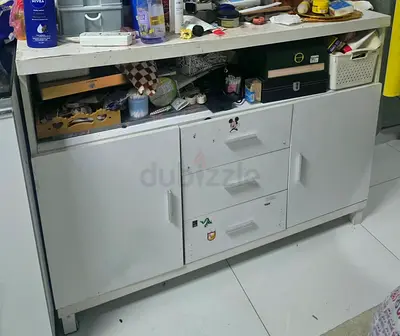White storage cabinet with drawers and countertop - used