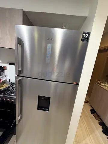 Stainless Steel Double Door Refrigerator with Water Dispenser - Good Condition