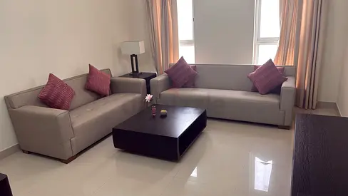 Two-piece grey fabric sofa set with coffee table