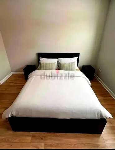IKEA queen size bed with mattress and storage drawers