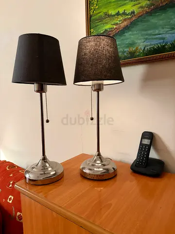 Pair of modern chrome table lamps with black shades