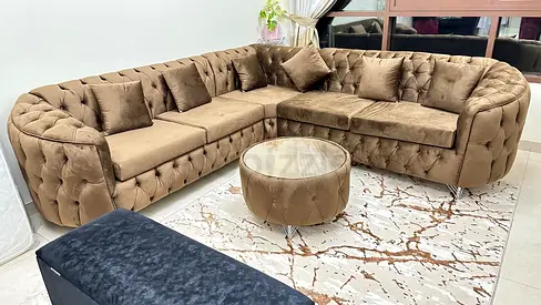 Brand new L shape sofa with round table and pillows we are selling