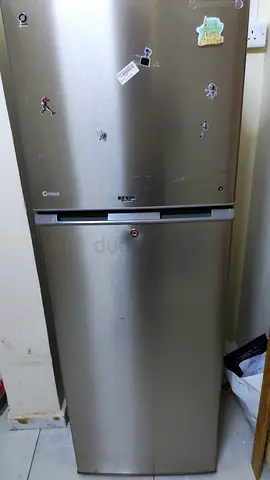 Double-door refrigerator with top freezer - not working, for scrap or repair
