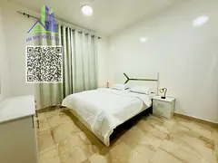 An exceptionally luxurious and upscale one-bedroom apartment with a living room, featuring brand-new