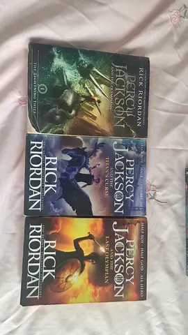 Percy Jackson trilogy by Rick Riordan - The Lightning Thief, Sea of Monsters, Last Olympian