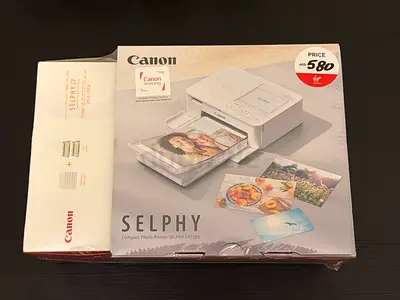 Canon SELPHY CP1000 Compact Photo Printer (CP910/CP820 compatible) - New/Sealed Paper Pack.