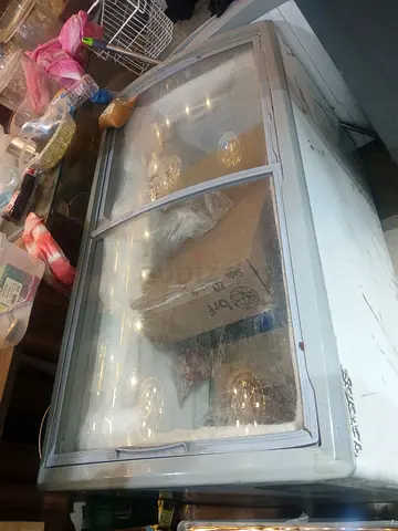 Used commercial display freezer - curved glass sliding top, needs cleaning