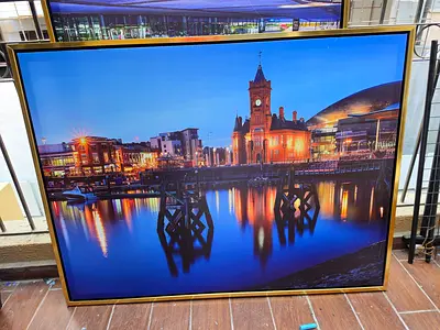 Large framed cityscape wall art - gold frame