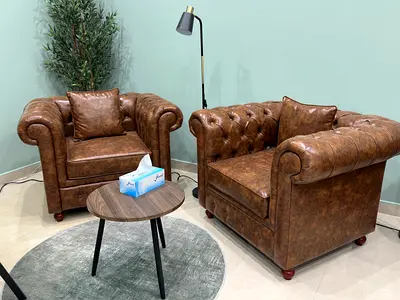 Brown Leather Chesterfield Armchairs