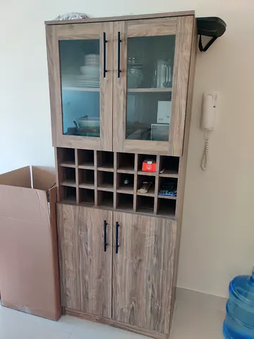 Wooden kitchen cabinet with glass doors and wine rack - good condition