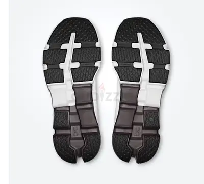 Used pair of men's running shoes - soles shown, good condition